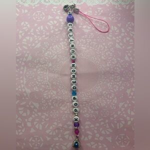 Handmade K-pop Demon Hunter inspired phone charm